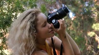 Una fotografa che vuole godere della natura